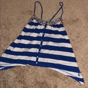 Striped and floral tank top. Cotton material.